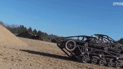 Crazy Mad Max Car Shows How Badass It Is By Scaling A Sand Wall