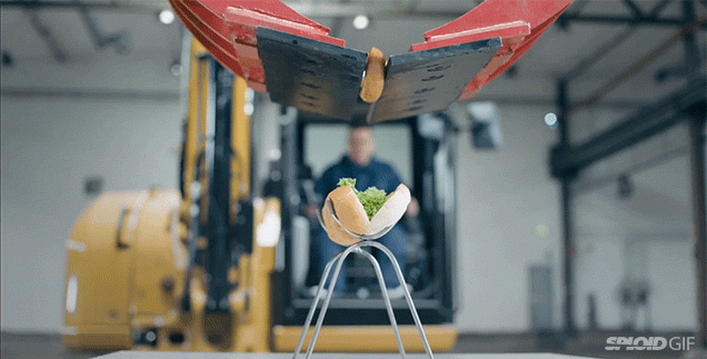Watch A Giant Excavator Precisely Put Together A Hot Dog