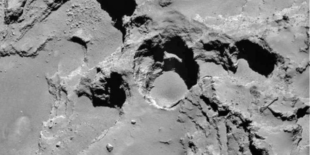 Rosetta’s Comet Is Developing Giant Sinkholes Before Our Eyes