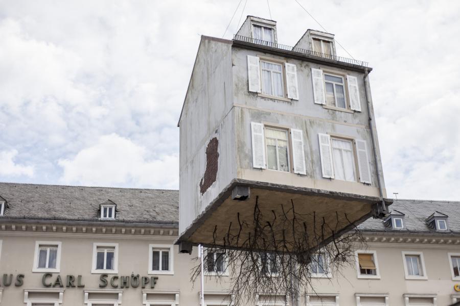 This House Dangling From A Construction Crane Is Art, Not An Accident