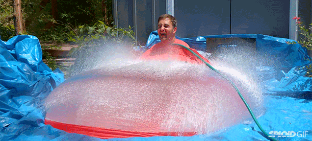Watch A Giant Water Balloon Explode In Slow Motion With A Man Inside It