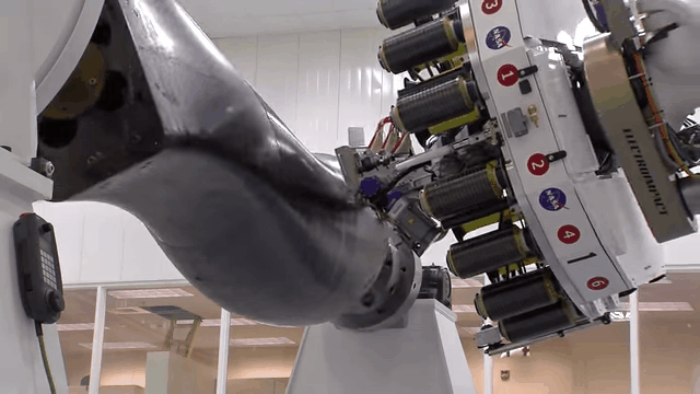 This Robot Is A Loom For Weaving Carbon Fibre Into Rocket Parts