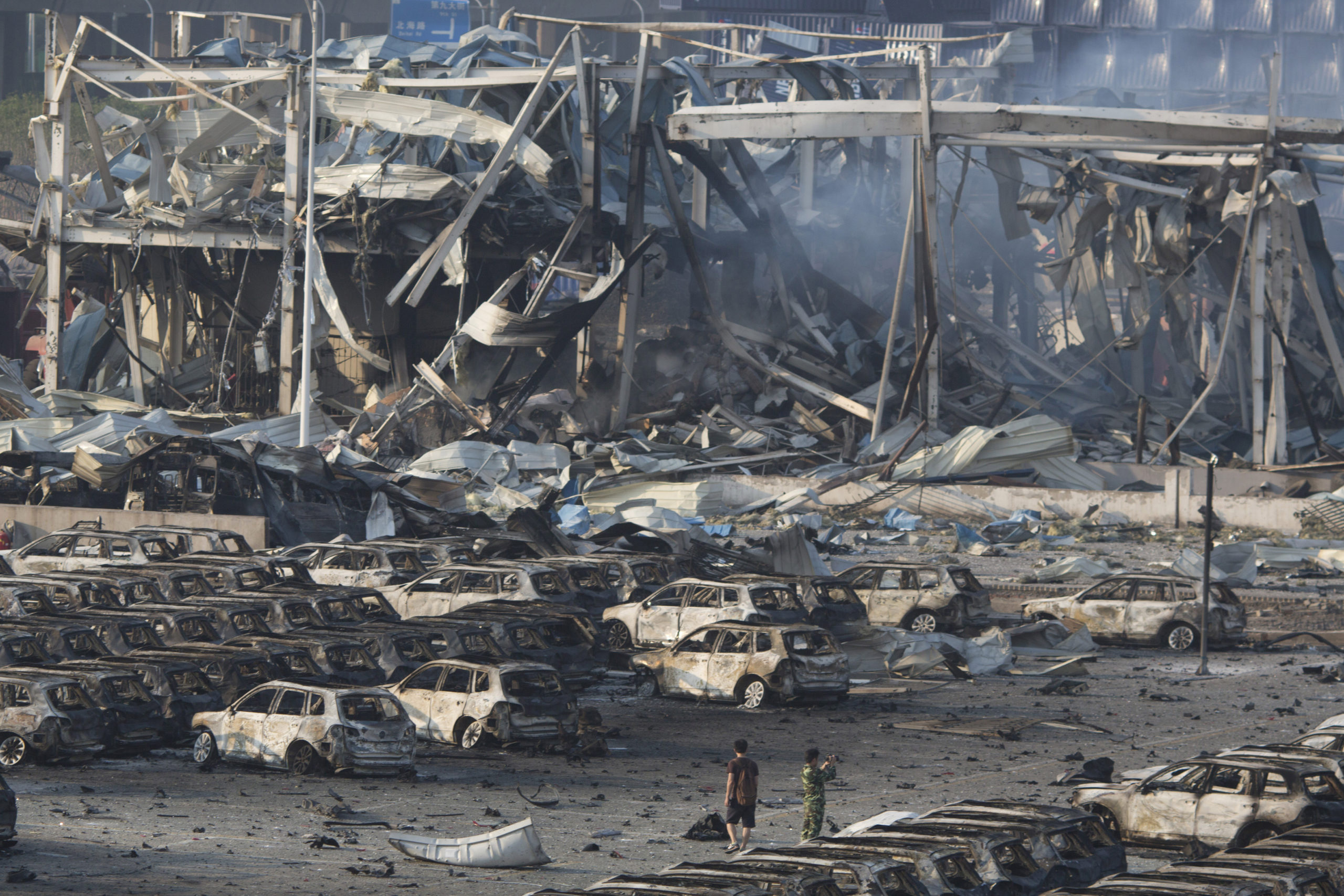 Photos From The Aftermath Of The Devastating Tianjin Explosion