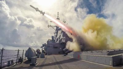 A US Navy Guided-Missile Destroyer Fires A Harpoon Missile In This Bad Arse Photo