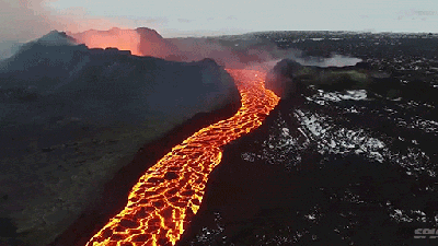 Incredible Drone Footage Of A Flowing Lava River