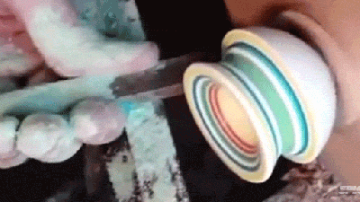 Watch A Jawbreaker Get Carved Into A Shot Glass On A Lathe