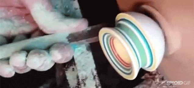 Watch A Jawbreaker Get Carved Into A Shot Glass On A Lathe