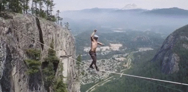 Watch A Guy Slack Line Between Two Cliffs 300 Metres Off The Ground
