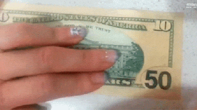Watch A US $50 Note Get Rubbed Off To Reveal A $10 Note