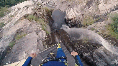 Watch A Guy Jump Nearly 60m Off A Cliff And Plunge Straight Into The Water