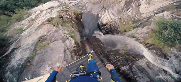 Watch A Guy Jump Nearly 60m Off A Cliff And Plunge Straight Into The Water