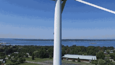 Drone Pilot Discovers Crazy Dude Sunbathing Atop A Towering Wind Turbine