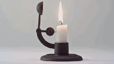 This Ingenious Candle Holder Automatically Extinguishes The Candle