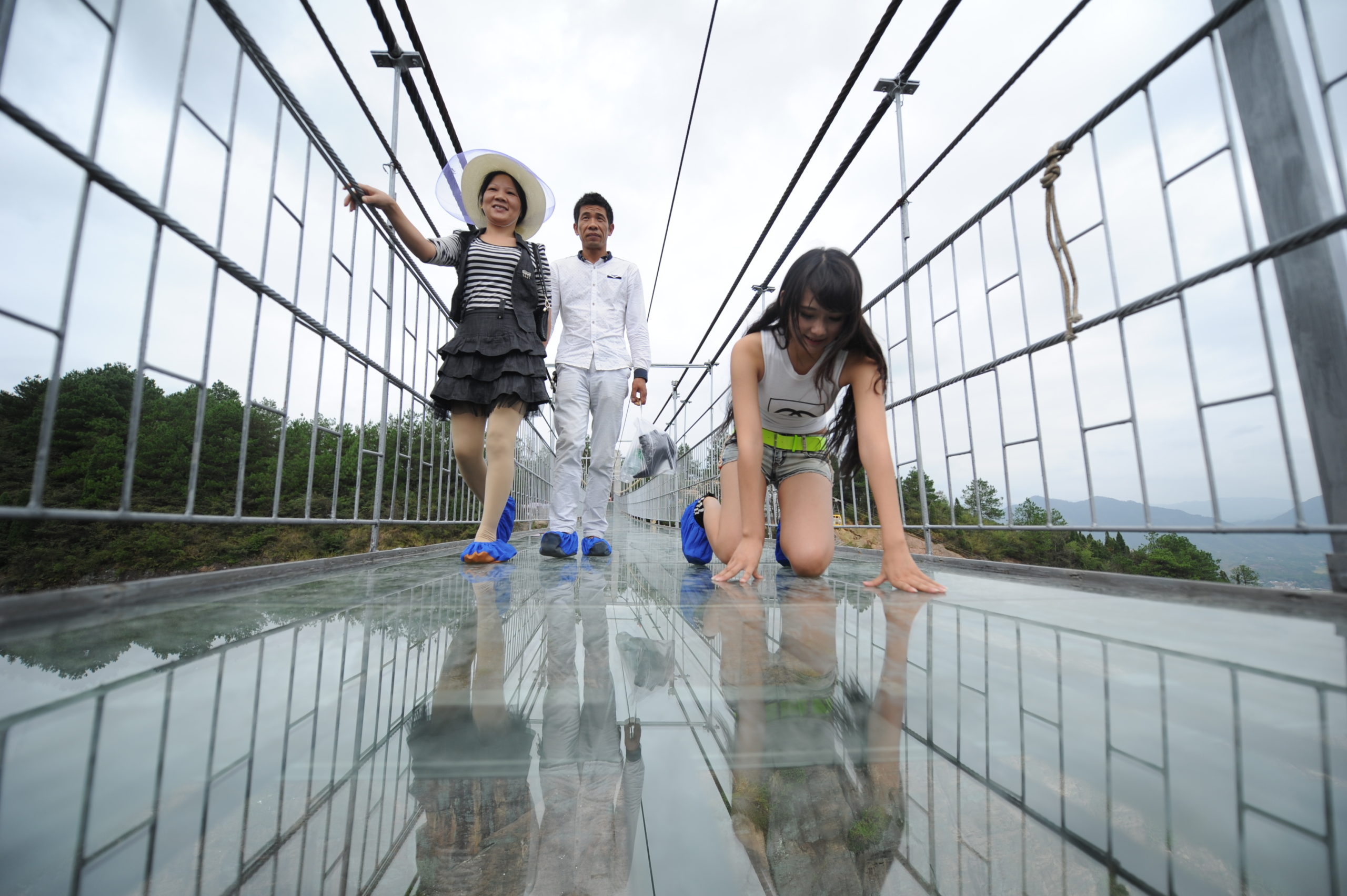The Longest Glass Bridge On Earth Caters To Tourists Who Like Being Scared Silly