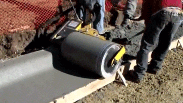 Seeing This Curb Roller Machine Shape Messy Cement Into A Smooth Curb Is So Satisfying