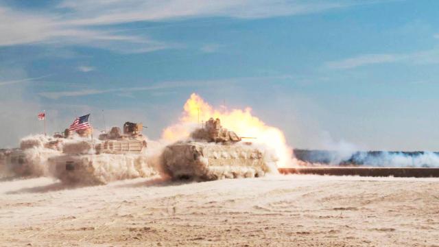 Amazing Photo Of M1 Abram Tanks Surrounded In A Force Field Of Dust After Firing Its Cannon