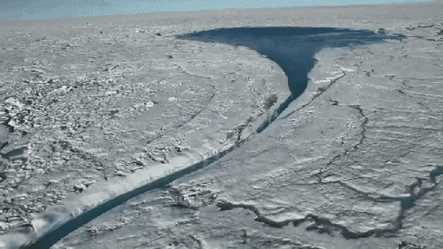 Crazy Drone Footage Shows A Huge Lake Of Melted Ice In Greenland
