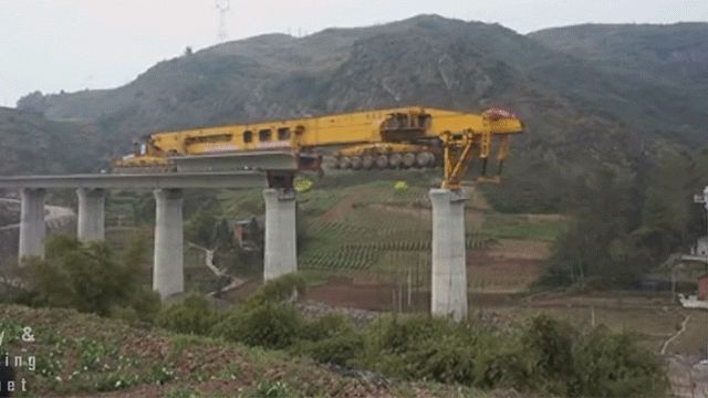 Watch This Mega Machine Erect A Bridge