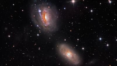 Behold The Cosmic Beauty Of Two Galaxies Unwinding Each Other