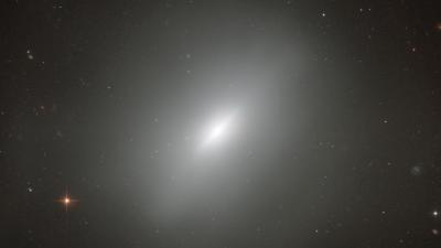 The Heart Of This Elliptical Galaxy Exposes A Ghost From Its Past