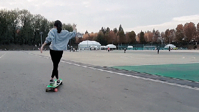 Seeing This Girl Dance On A Longboard Is Beautifully Mind Bending