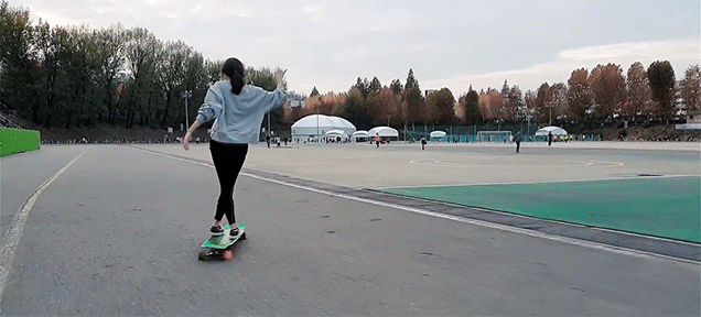 Seeing This Girl Dance On A Longboard Is Beautifully Mind Bending