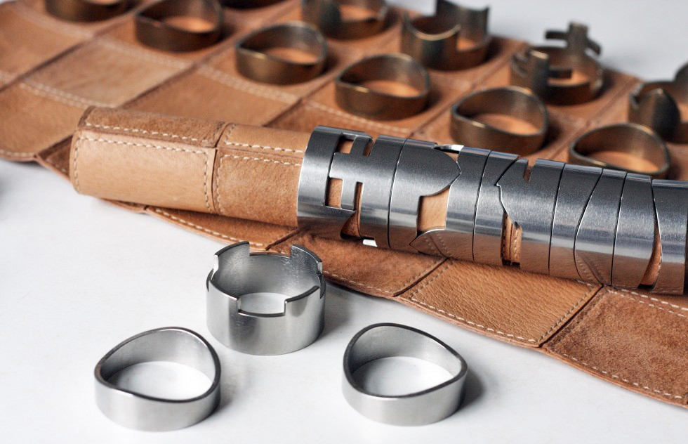 Stackable Chess Pieces Hide A Rolled Up Leather Board Inside