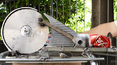 This Machine That Crushes Cans Is So Hypnotic