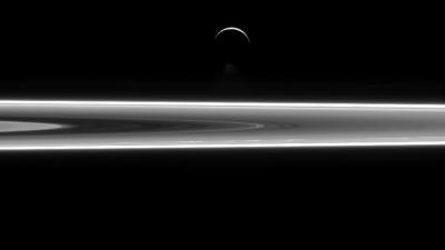 A Glorious New Cassini Image Shows Enceladus Floating Above Saturn’s Rings