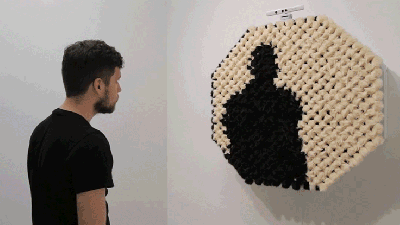 A Mirror Made Of Fuzzy Pom-Poms Is A Creepy, Beautiful Thing