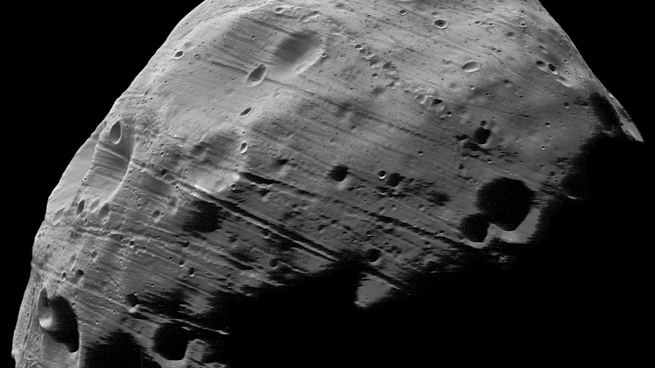 One Of Mars’ Moons Is Literally Pulling Itself To Pieces