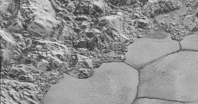 Astronomers Think A Space Rock The Size Of Manhattan Created Pluto’s Weird, Bumpy Plains