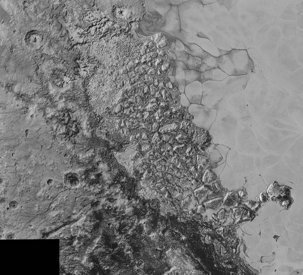 Astronomers Think A Space Rock The Size Of Manhattan Created Pluto’s Weird, Bumpy Plains