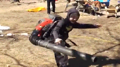 Kid Wearing A Leaf Blower Hilariously Loses Control And Starts Spinning In Circles