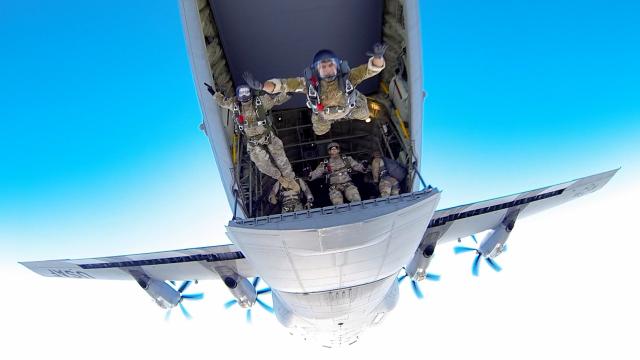 Awesome Photo Of US Air Force Airmen Jumping Off A C-130 Hercules Aircraft