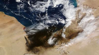 Shocking NASA Satellite Photos Reveal Large Area Covered In Black Smoke Caused By Oil Fires