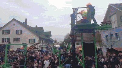 The Best Parade Float Ever Has A Working, Death-Defying Roller Coaster On It