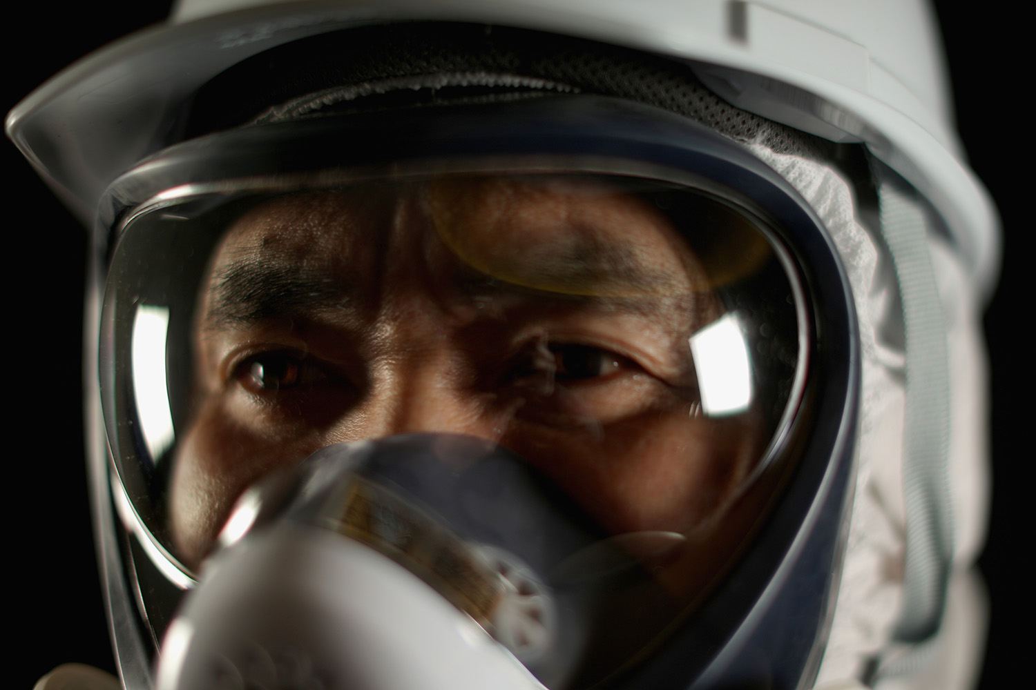 Fukushima Workers Don Their Protective Gear In These Eerie Portraits From The Exclusion Zone