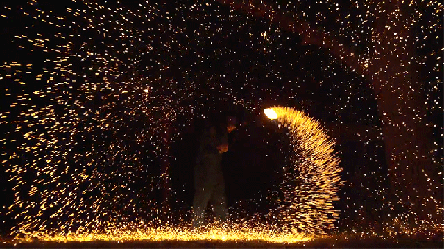 Burning Steel Wool Becomes A Spinning Blade Of Fire In Slow Motion