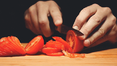Seeing Tomatoes Get Unsliced Is Really Bizarre