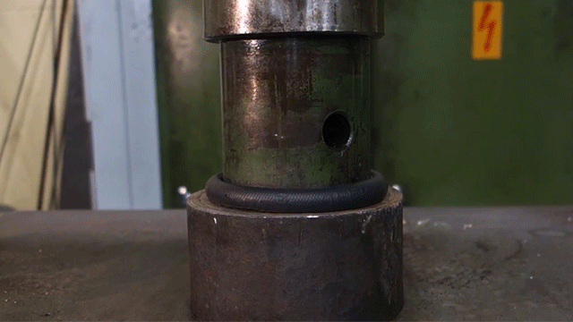 Hockey Pucks Are Tiny Bombs Waiting To Be Smooshed By A Super-Strong Hydraulic Press 