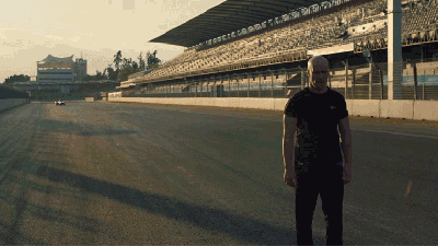 Watch Fearless Stuntman Do A Blind Backflip Over A Speeding Race Car