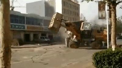 Watch Six Bulldozers Battle Each Other On The Streets Of China In The Craziest Fight Ever