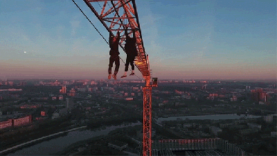 Just Two Guys Dangling Off A Crane Like It’s No Big Deal