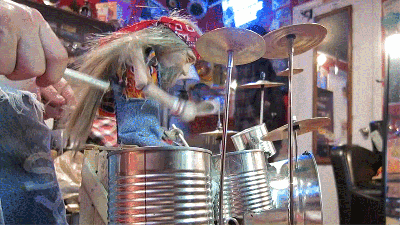 Watch A Tiny Puppet Drummer Rock Out To Rush’s Tom Sawyer On Soup Cans