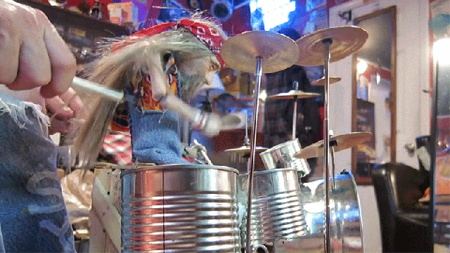 Watch A Tiny Puppet Drummer Rock Out To Rush’s Tom Sawyer On Soup Cans