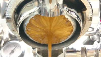 Gorgeous Shot Of An Espresso Being Poured From The Machine