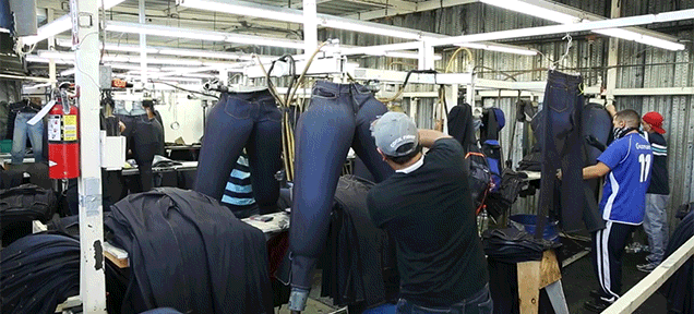 The Weird Methods Used To Make Brand New Jeans Look Old