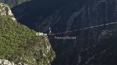 Walking A Record-Breaking One Kilometre On A Slackline Over Mountains Is Truly Crazy