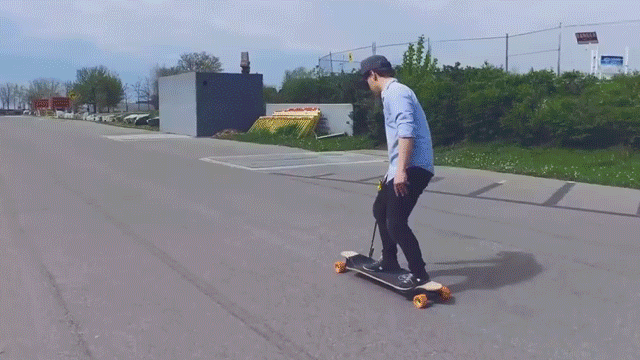A Drill-Powered Electric Skateboard Is The Silliest Way To Get Around Town